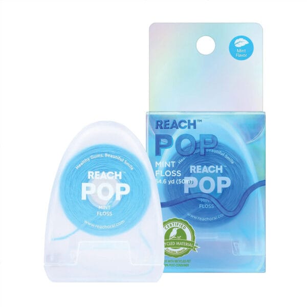 REACH POP fil dentaire menthe - fil dentaire végétal, ciré, 384 microfils & emballage durable, 50m. Photo produit avec emballage.